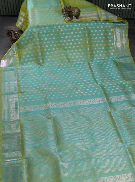 Venkatagiri silk saree dual shade of greenish yellow with allover silver zari woven buttas and silver zari woven border