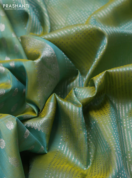 Venkatagiri silk saree dual shade of greenish yellow with allover silver zari woven buttas and silver zari woven border