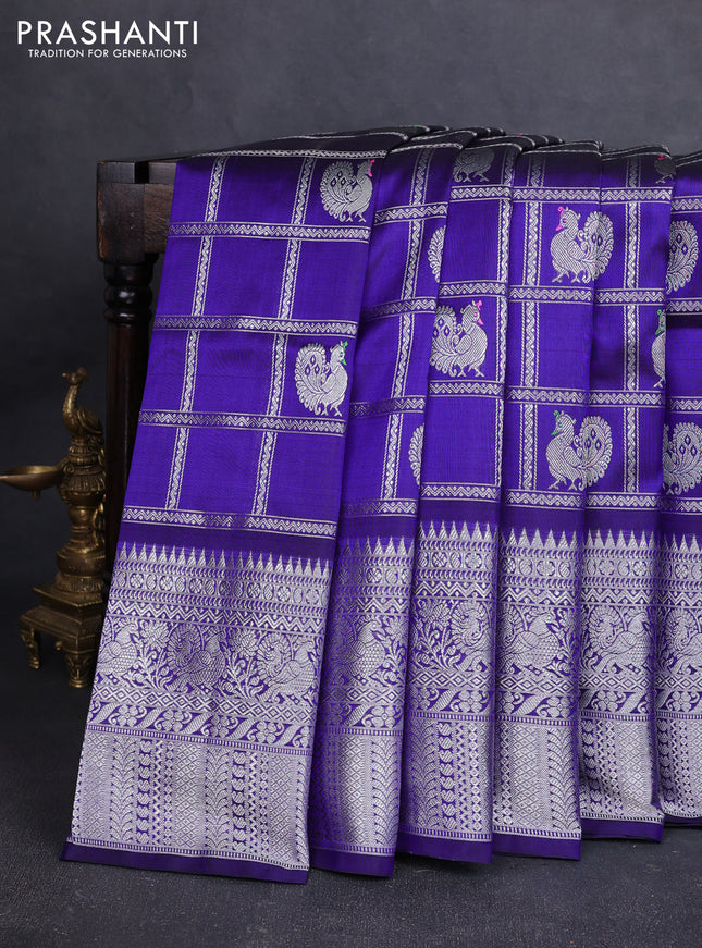 Venkatagiri silk saree blue with allover silver zari checks & buttas and long zari woven border