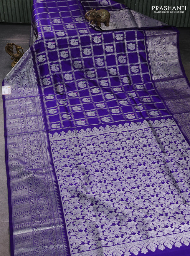 Venkatagiri silk saree blue with allover silver zari checks & buttas and long zari woven border