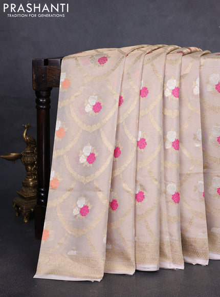 Banarasi tissue uppada silk saree cream with allover thread & zari floral weaves and zari woven border