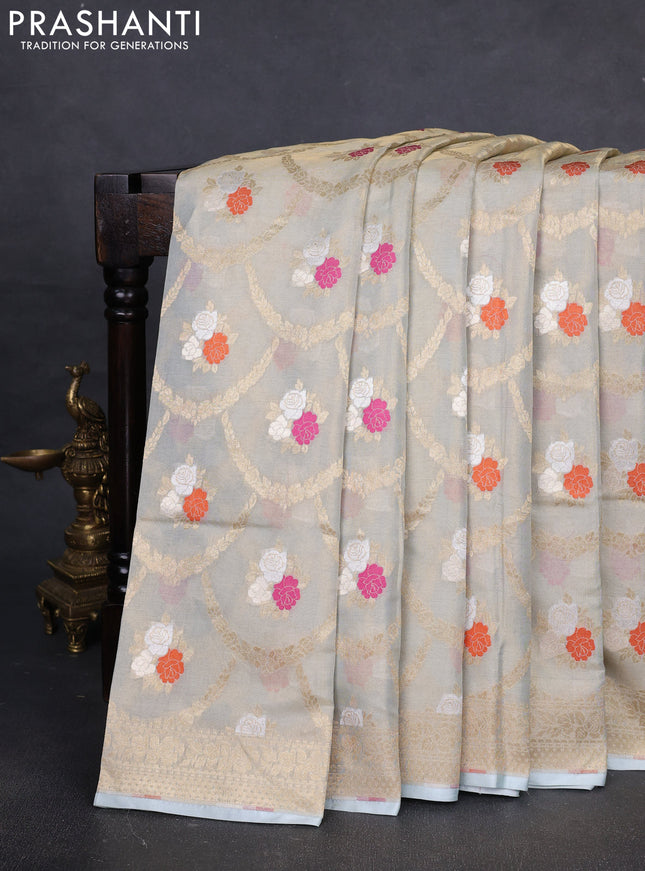 Banarasi tissue uppada silk saree cream and pastel blue with allover zari weaves and zari woven border