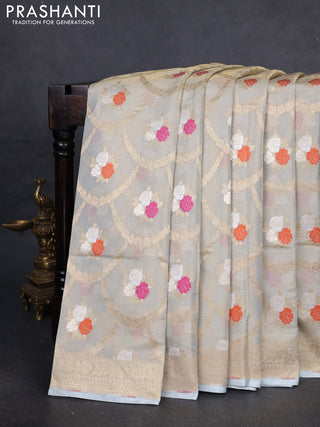 Banarasi tissue uppada silk saree cream and pastel blue with allover zari weaves and zari woven border