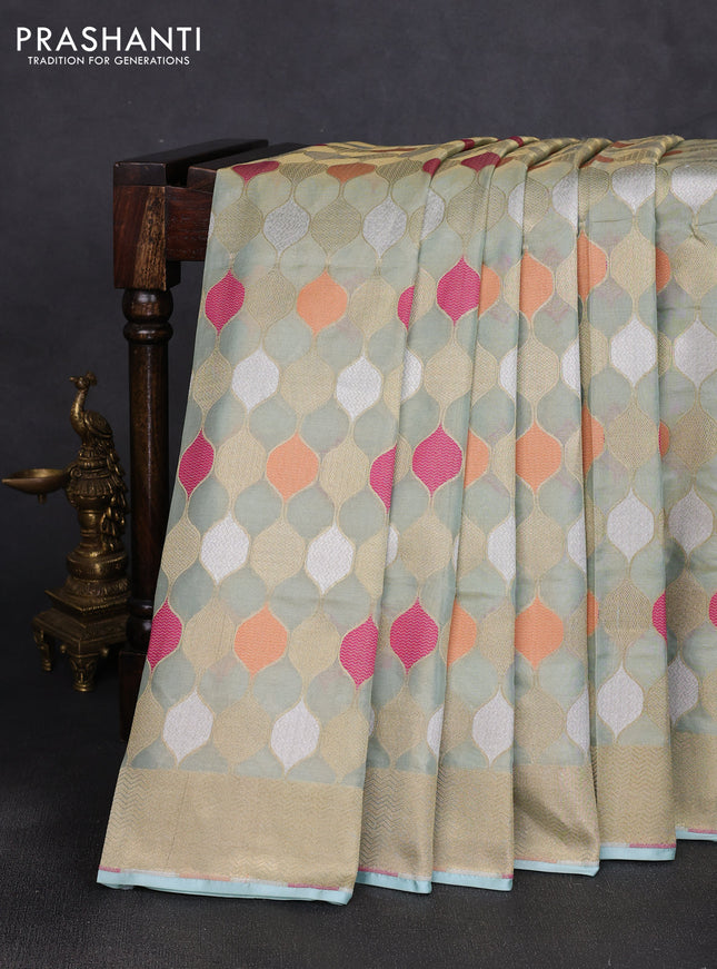 Banarasi tissue uppada silk saree teal blue with allover thread & zari geometric weaves and zari woven border