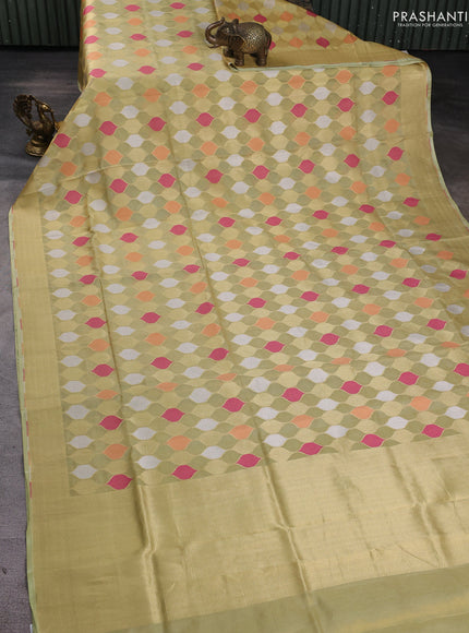 Banarasi tissue uppada silk saree pista green with allover thread & zari geometric weaves and zari woven border