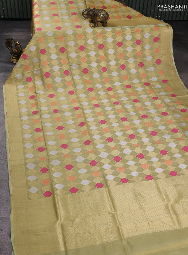 Banarasi tissue uppada silk saree pista green with allover thread & zari geometric weaves and zari woven border