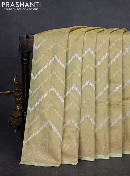 Banarasi tissue uppada silk saree pista green with allover thread & zari zig zag weaves and zari woven border