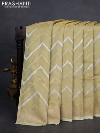 Banarasi tissue uppada silk saree pista green with allover thread & zari zig zag weaves and zari woven border