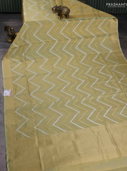 Banarasi tissue uppada silk saree pista green with allover thread & zari zig zag weaves and zari woven border