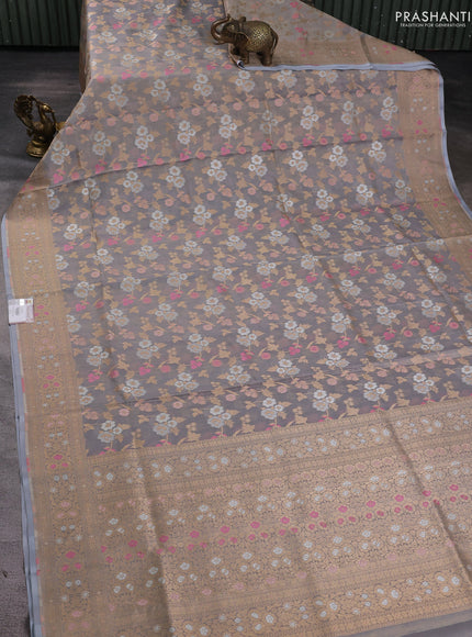 Banarasi tissue uppada silk saree pastel grey with allover thread & zari floral weaves and zari woven border