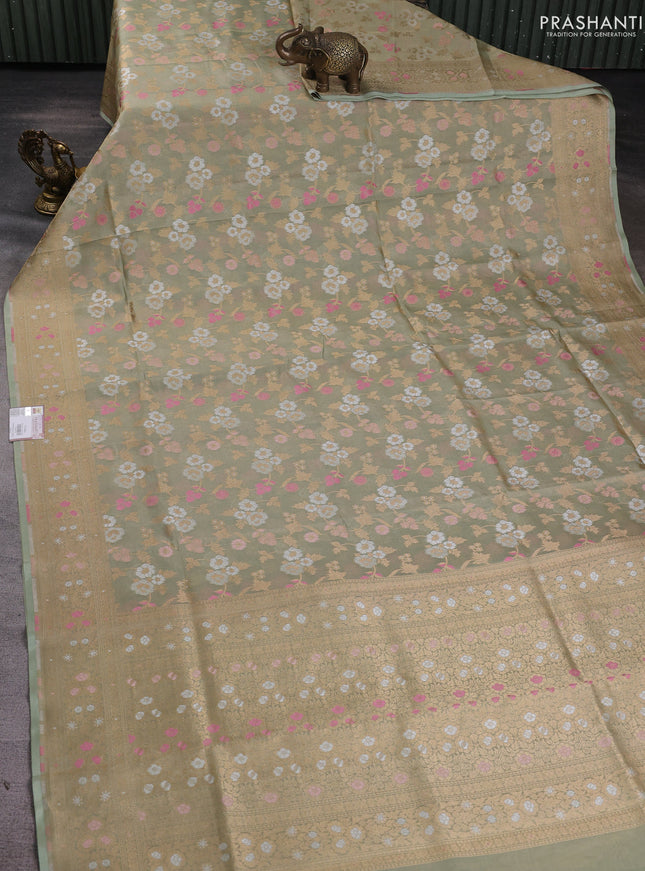Banarasi tissue uppada silk saree pista green with allover thread & zari floral weaves and zari woven border