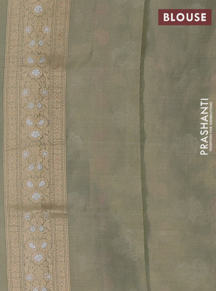 Banarasi tissue uppada silk saree pista green with allover thread & zari floral weaves and zari woven border