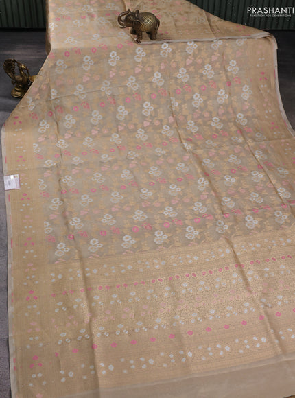 Banarasi tissue uppada silk saree cream with allover thread & zari floral weaves and zari woven border