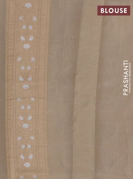 Banarasi tissue uppada silk saree cream with allover thread & zari floral weaves and zari woven border