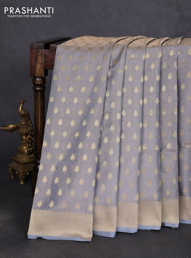 Banarasi tissue uppada silk saree grey with allover zari woven butta weaves and zari woven border