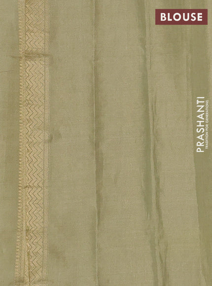 Banarasi tissue uppada silk saree pista green with allover zari woven butta weaves and zari woven border
