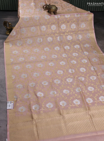 Banarasi tissue uppada silk saree mild peach with allover thread & zari floral weaves and zari woven border