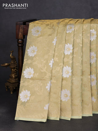 Banarasi tissue uppada silk saree pista green with allover thread & zari floral weaves and zari woven border