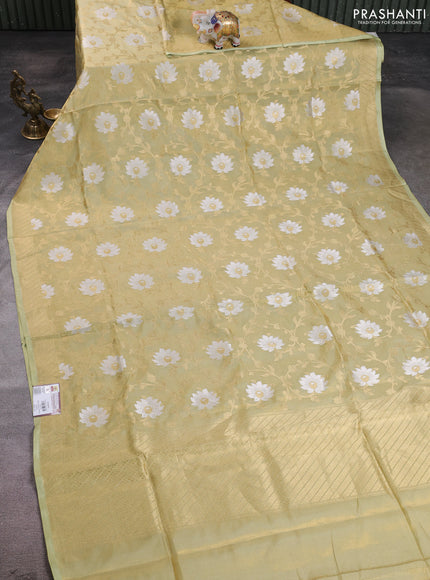 Banarasi tissue uppada silk saree pista green with allover thread & zari floral weaves and zari woven border