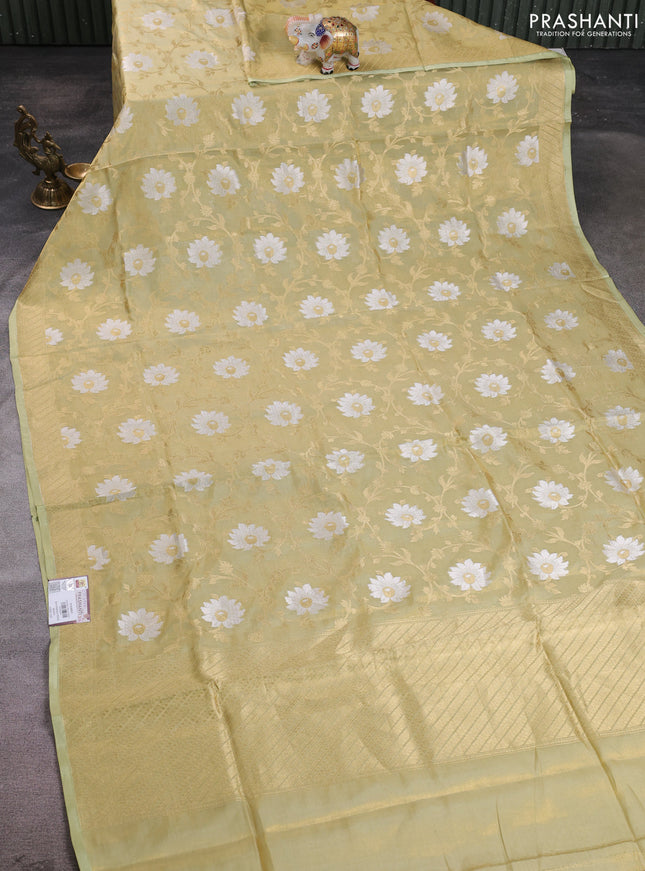 Banarasi tissue uppada silk saree pista green with allover thread & zari floral weaves and zari woven border