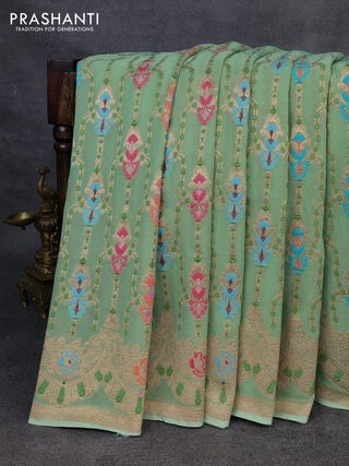Banarasi semi georgette saree pista green with allover thread & zari weaves and woven border