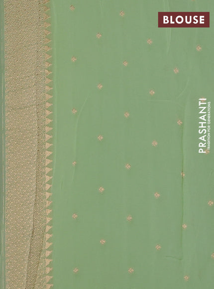 Banarasi semi georgette saree pista green with allover thread & zari woven buttas and paithani style border