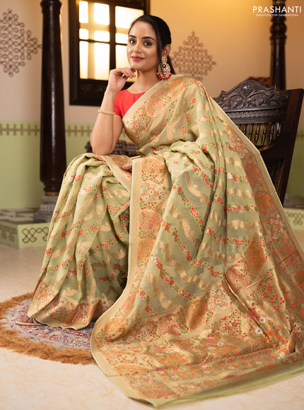 Banarasi semi georgette saree pista green with allover thread & zari weaves and woven border