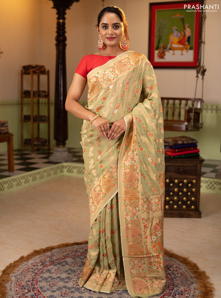 Banarasi semi georgette saree pista green with allover thread & zari weaves and woven border