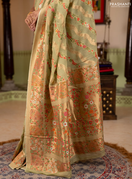 Banarasi semi georgette saree pista green with allover thread & zari weaves and woven border