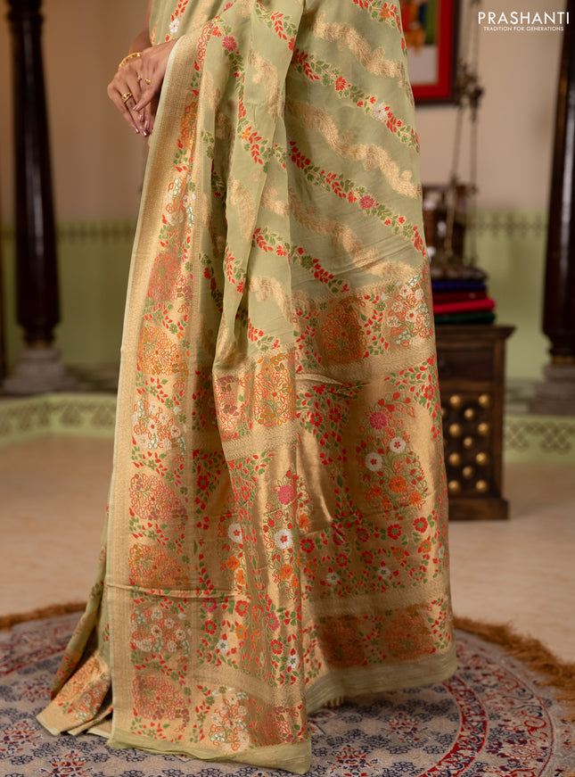 Banarasi semi georgette saree pista green with allover thread & zari weaves and woven border