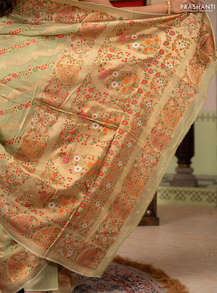 Banarasi semi georgette saree pista green with allover thread & zari weaves and woven border