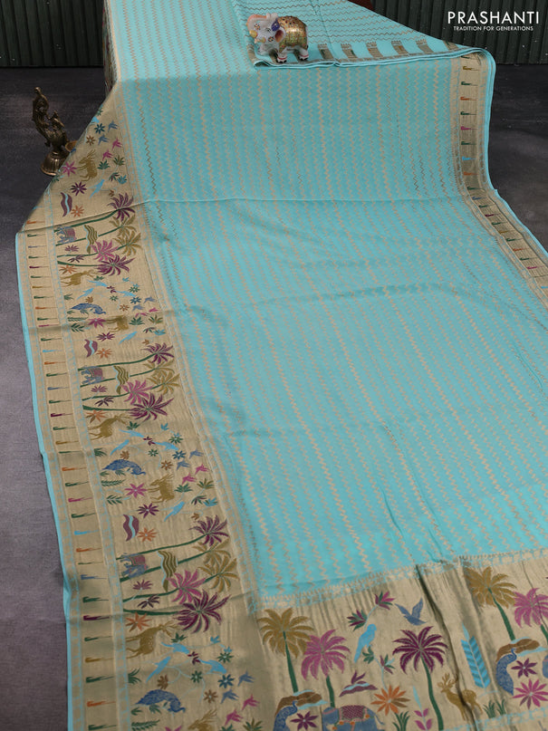 Banarasi semi georgette saree teal blue with allover zari zigzag weaves and paithani style border