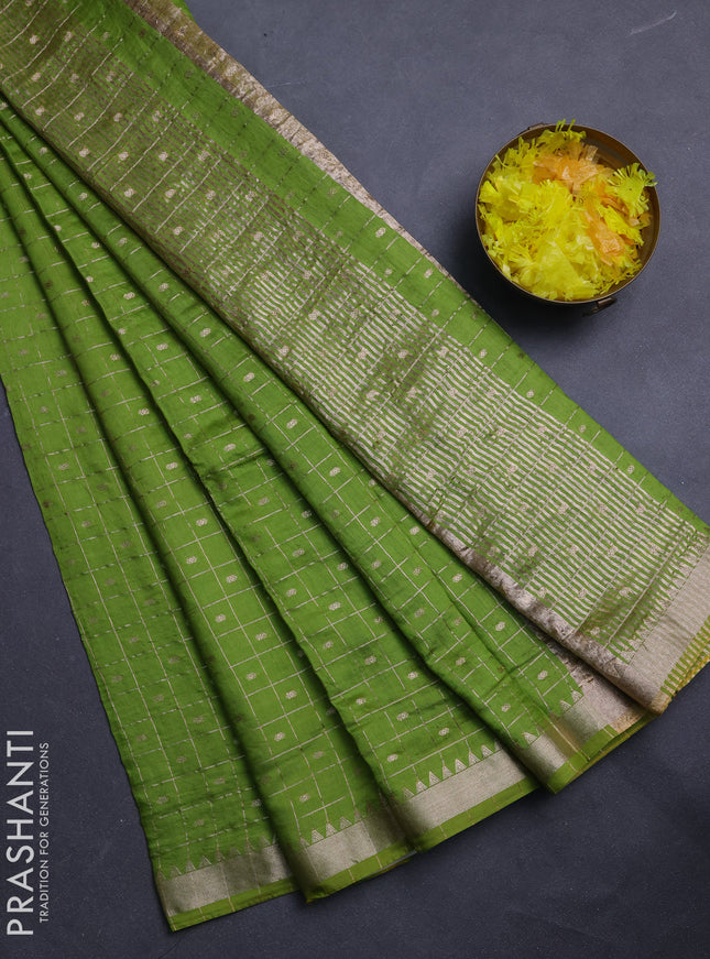 Semi chanderi saree light green and navy blue with allover zari checks & buttas and zari woven border