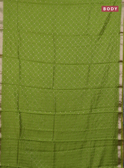 Semi chanderi saree light green and navy blue with allover zari checks & buttas and zari woven border