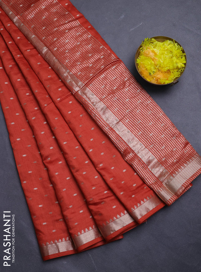Semi chanderi saree rust shade and light green with allover zari woven buttas and zari woven border