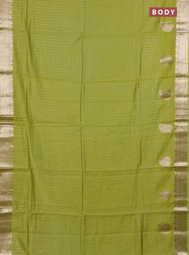 Semi chanderi saree light green and violet with allover zari checked pattern and zari woven paisley butta border