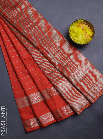 Semi chanderi saree rust shade and green with allover zari weaves and rettapet zari woven border