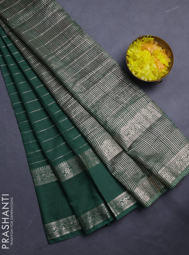 Semi chanderi saree green and pink with allover zari weaves and rettapet zari woven border