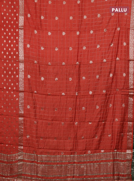 Semi chanderi saree orange and green with allover zari checks & buttas and zari woven butta border