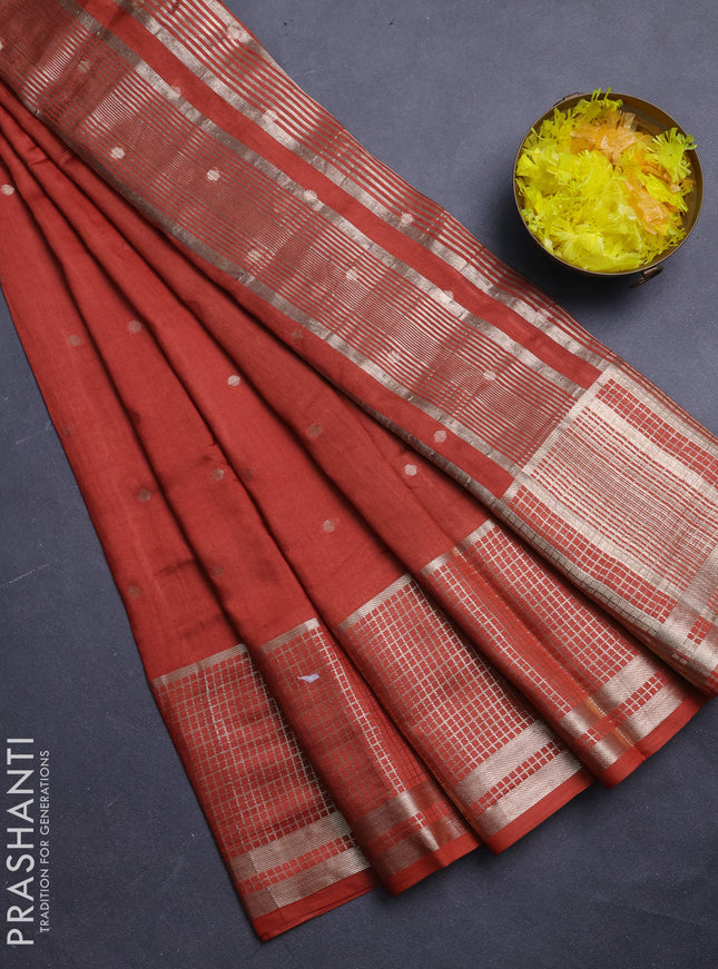 Semi chanderi saree rust shade and deep wine with allover zari woven buttas and long zari woven border