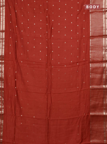 Semi chanderi saree rust shade and deep wine with allover zari woven buttas and long zari woven border