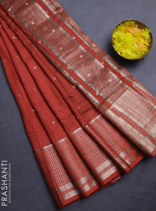 Semi chanderi saree rust shade and black with allover zari woven buttas and long zari woven border