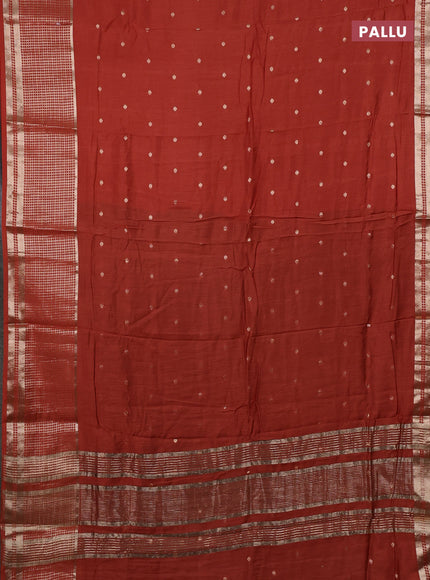 Semi chanderi saree rust shade and black with allover zari woven buttas and long zari woven border