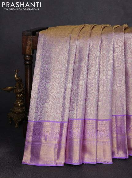 Pure kanchipuram tissue silk saree mild lavender and lavender with allover silver zari woven brocade weaves and rich zari woven border