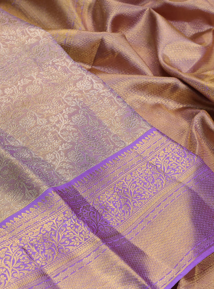 Pure kanchipuram tissue silk saree mild lavender and lavender with allover silver zari woven brocade weaves and rich zari woven border
