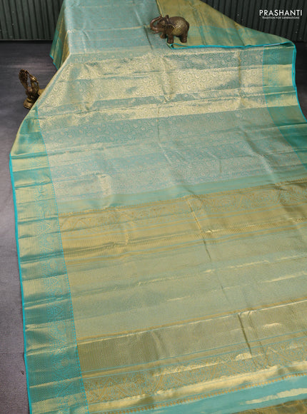 Pure kanchipuram tissue silk saree dual shade of teal and teal blue with allover zari woven brocade weaves and rich zari woven border