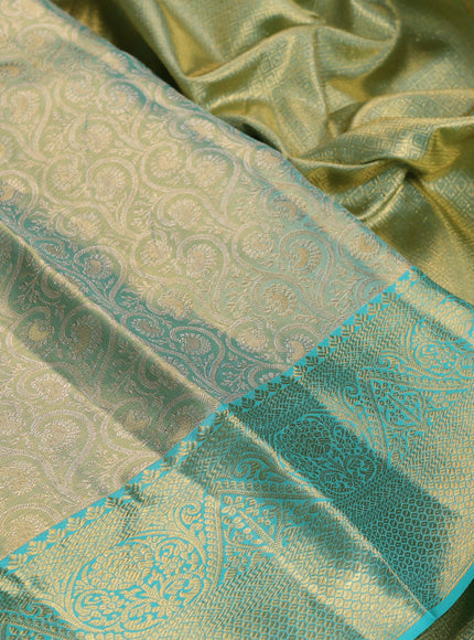 Pure kanchipuram tissue silk saree dual shade of teal and teal blue with allover zari woven brocade weaves and rich zari woven border