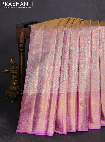 Pure kanchipuram tissue silk saree dual shade of lotus pink and mild lavender with allover silver zari woven brocade weaves and rich zari woven border