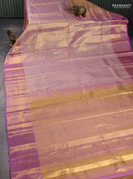 Pure kanchipuram tissue silk saree dual shade of lotus pink and mild lavender with allover silver zari woven brocade weaves and rich zari woven border