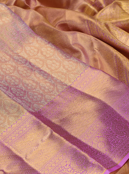 Pure kanchipuram tissue silk saree dual shade of lotus pink and mild lavender with allover silver zari woven brocade weaves and rich zari woven border